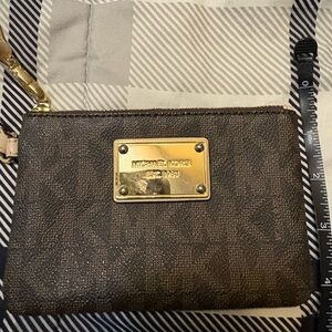 Michael Kors Dark Brown Logo Print Wristlet with Gold Plate